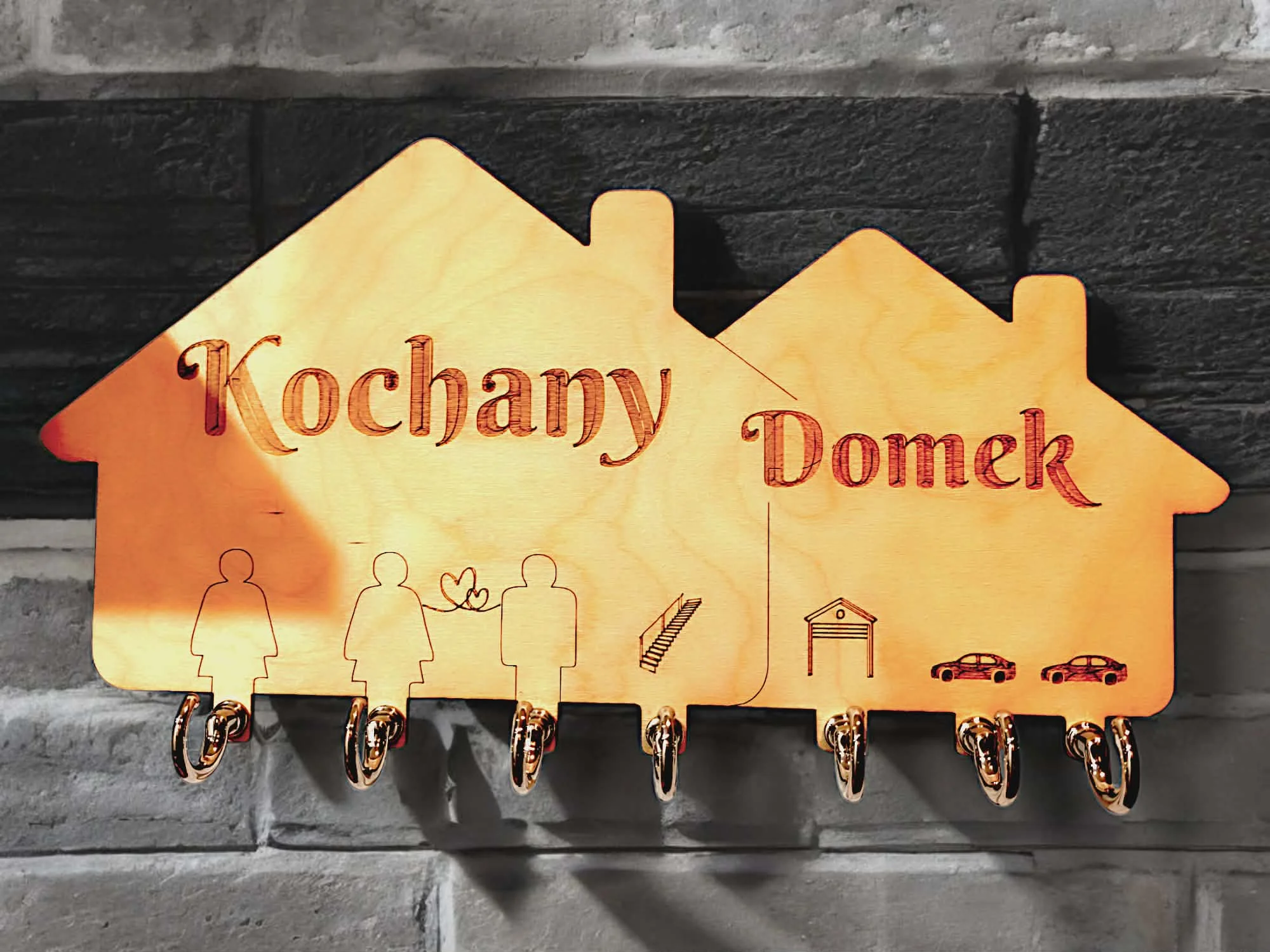 Wieszak na klucze wycinany laserowo z drewna.